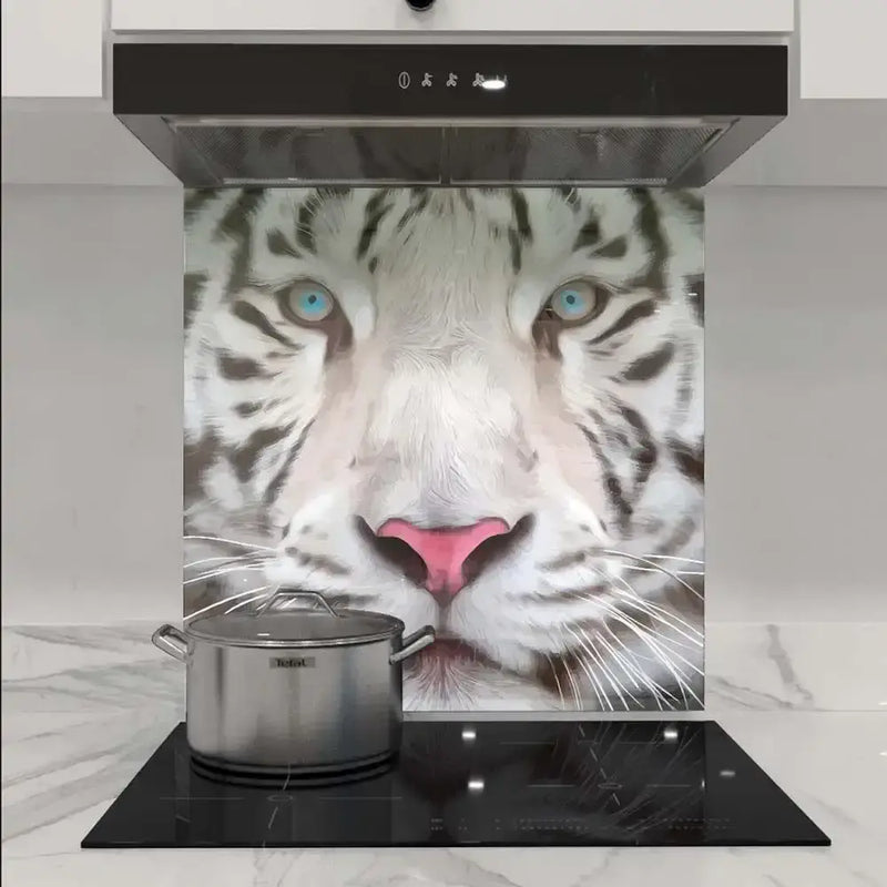 White tiger face printed on kitchen glass splashback behind induction hob