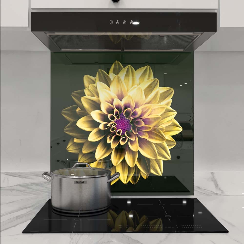 Bespoke kitchen glass splashback with vibrant yellow flower design, modern induction hob, sleek extractor hood