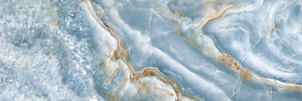 Blue onyx-inspired finish for an LED backlit glass feature wall