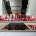 Bespoke glass splashback with red forest print, modern kitchen, UK-made design