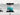 Teal ombre glass kitchen splashback with marble countertop and induction hob