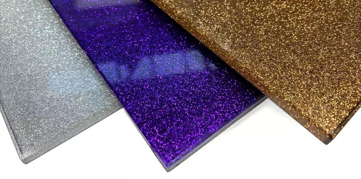 Sparkling silver, purple, and gold decorative glass panels for luxury interiors and bespoke architectural projects.