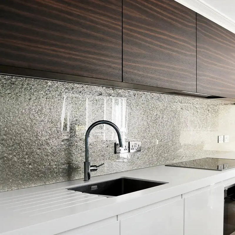 Luxury kitchen with textured glass splashback, modern sink, and dark wood cabinets