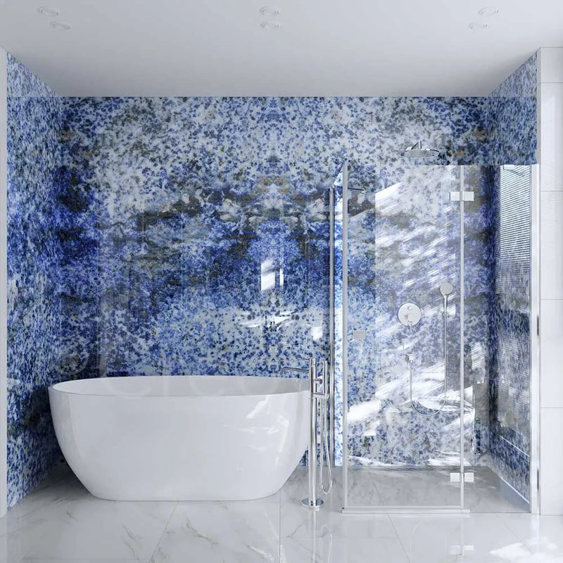 Luxury bathroom with blue speckled decorative glass wall and frameless shower enclosure
