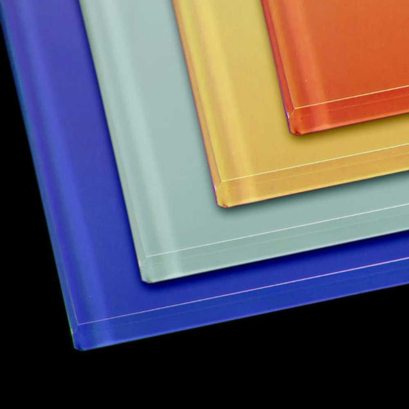 Colorful architectural glass panels in blue, green, yellow, and orange for bespoke interior design