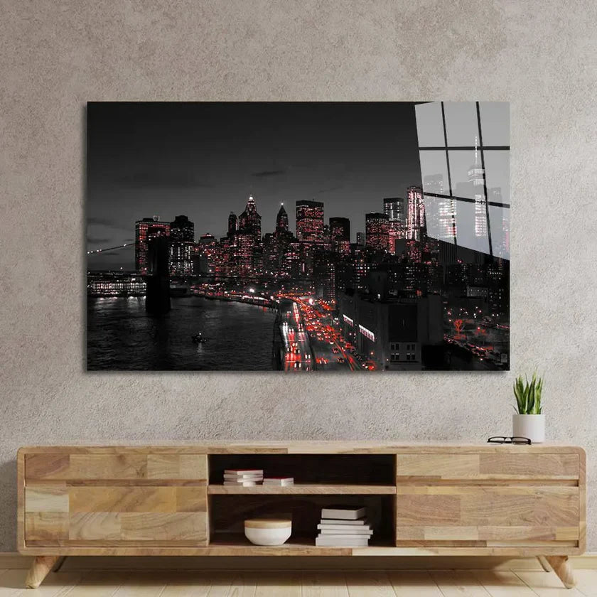 Bespoke glass wall art featuring NYC skyline at night, mounted above modern wooden console in luxury interior