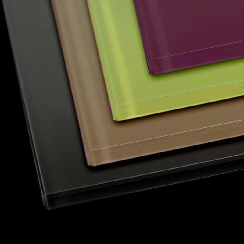 Stacked colored glass panels in black, bronze, lime, and purple for architectural use