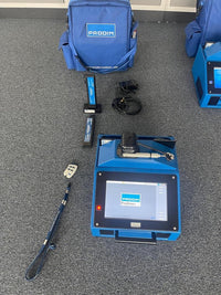 PRODIM Proliner 7 digital measuring system with accessories and blue carrying bag on carpet