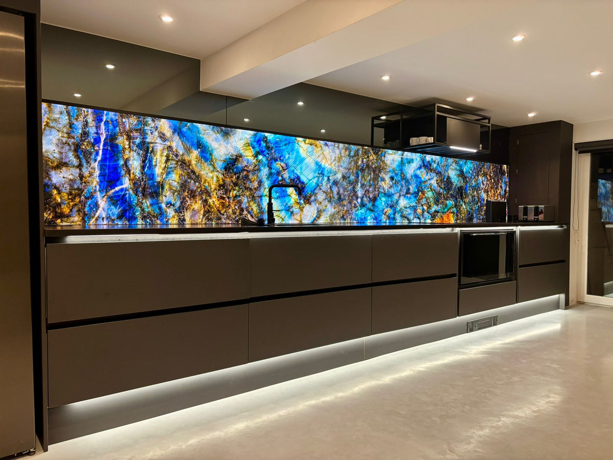Blue decorative glass splashback in a completed Windsor kitchen