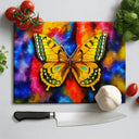 Colorful kitchen scene with a yellow butterfly chopping board, chef knife, tomatoes, garlic, and basil