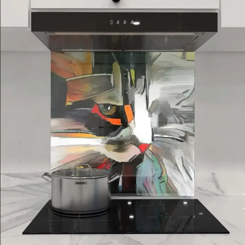 Abstract art glass splashback in modern kitchen with induction hob and extractor hood