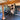 Gym mirror wall at The Byre with strength training equipment and exposed timber structure