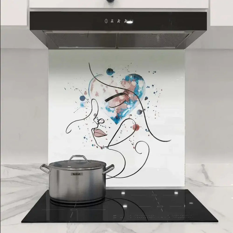 Abstract face art glass splashback with blue heart design in modern kitchen