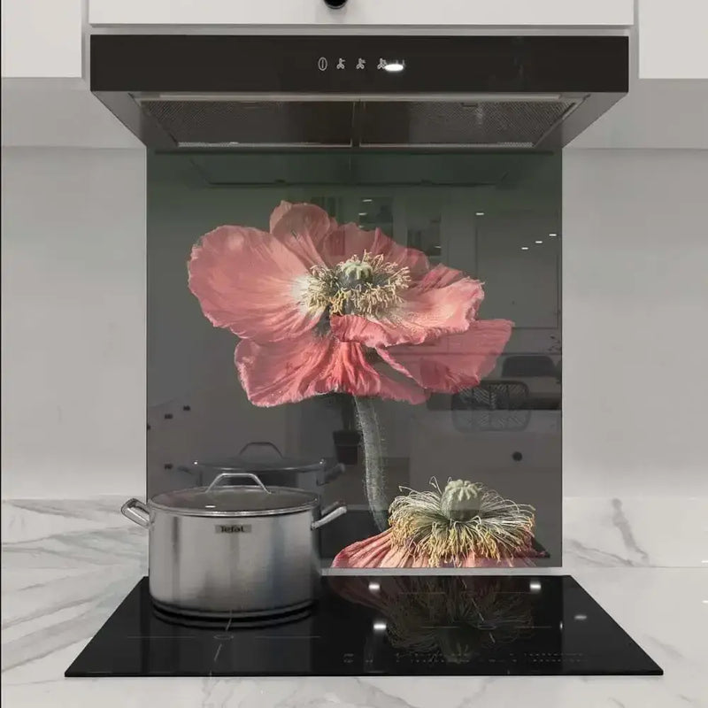 Bespoke floral glass splashback with pink poppy design in modern kitchen, featuring decorative glass and LED backlit effect.