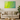Modern living room with beige sofa, green cushions, round wooden coffee table, and abstract green-yellow vortex wall art