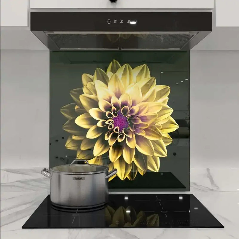 Bespoke kitchen glass splashback with vibrant yellow flower design, modern induction hob, sleek extractor hood